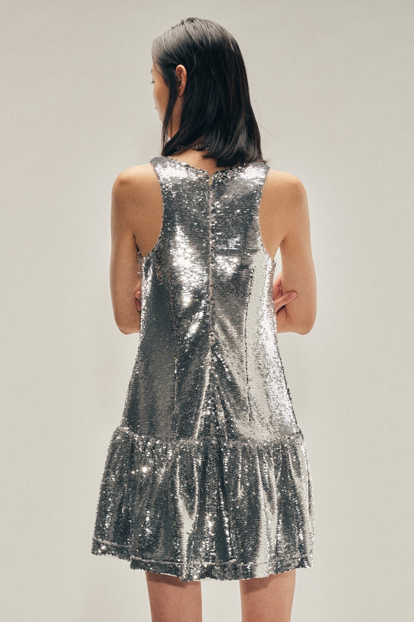 Tapered Back Peplum Mini Dress