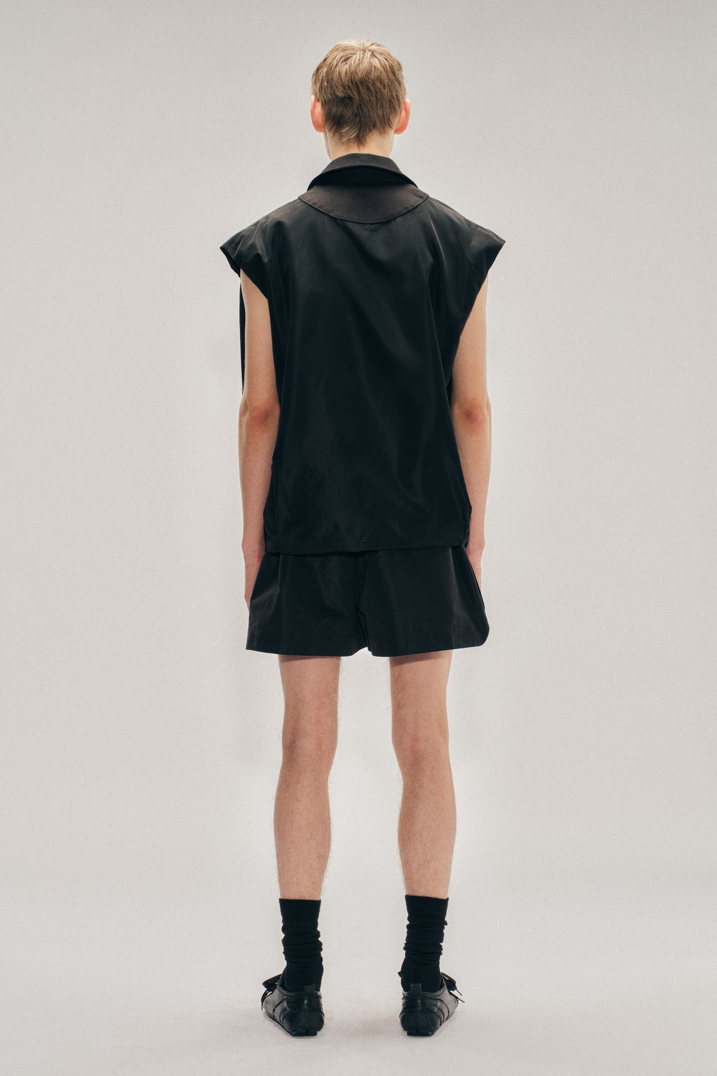 Draped Bubble Hem Pressed Rosette Top