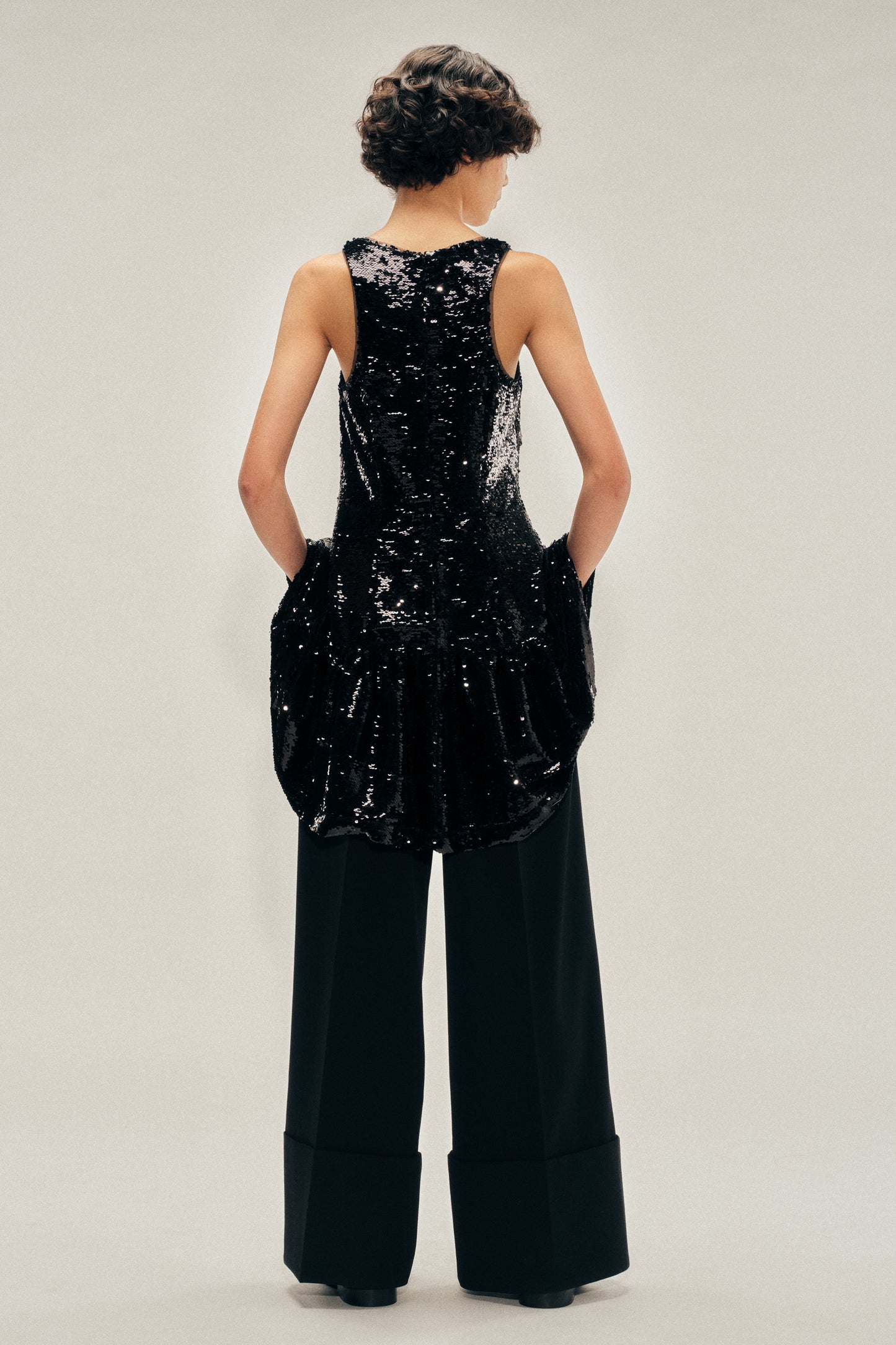 Tapered Back Peplum Mini Dress