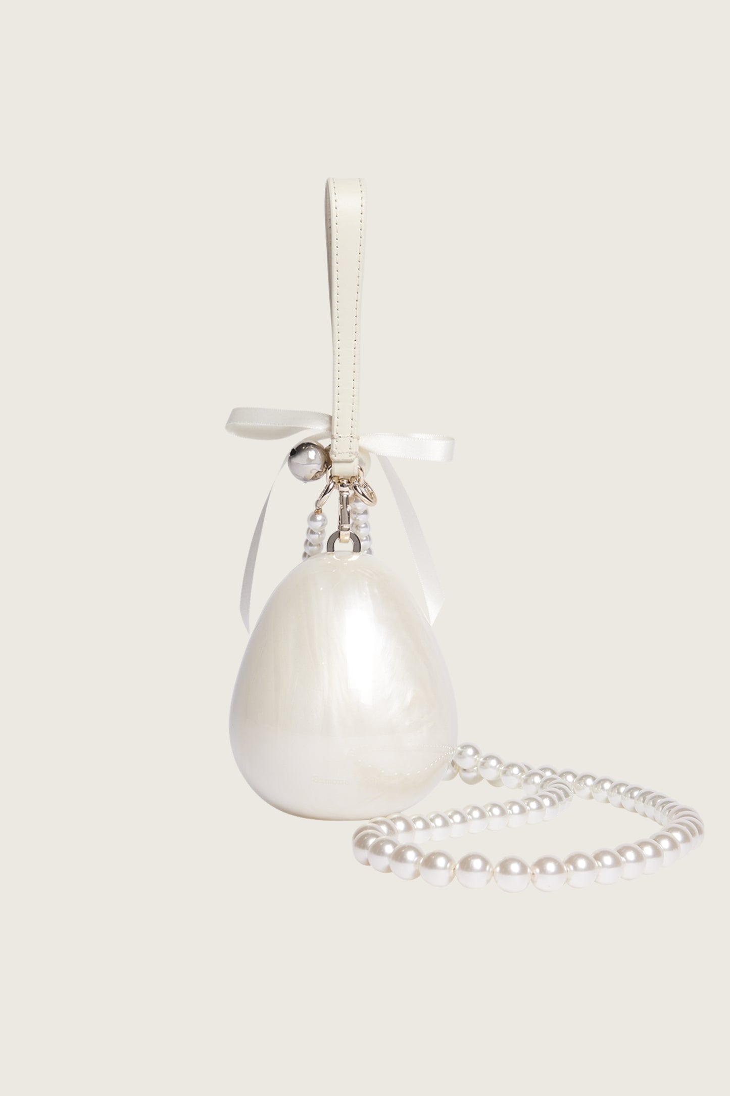 Bell Charm Micro Pearl Egg Bag